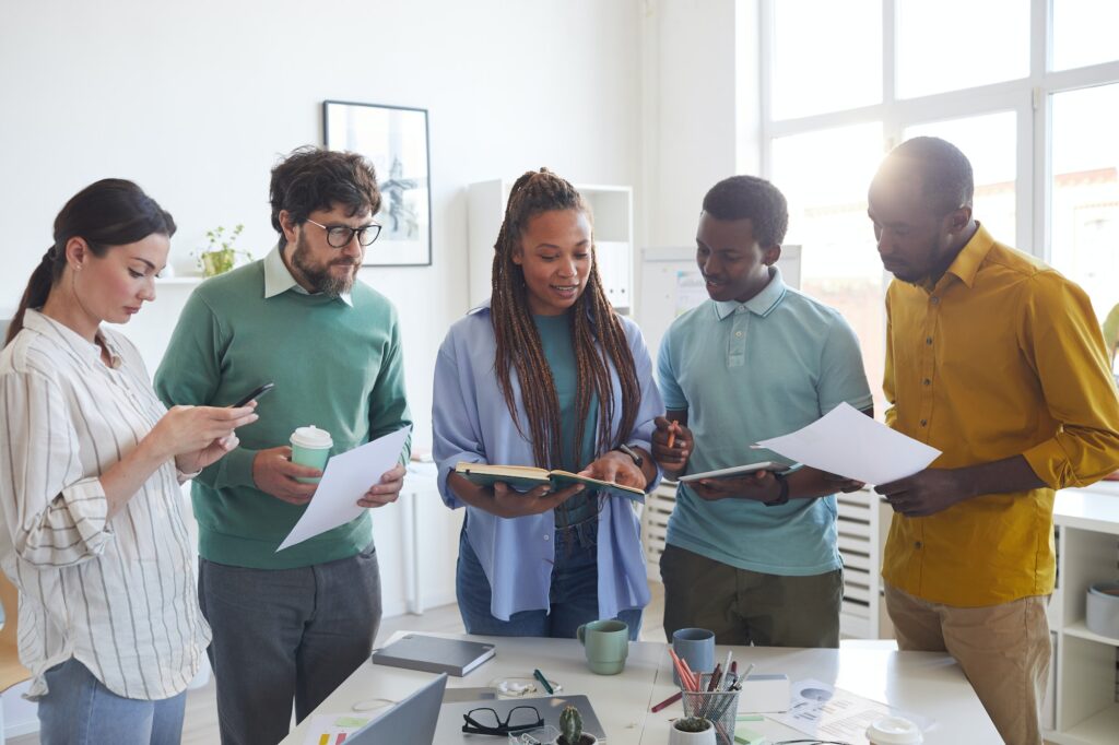 diverse business team standing in office